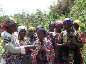 Discussing varieties of trees at a tree planting in Democratic Republic of Congo