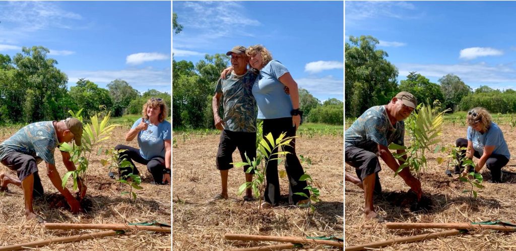 Bennett Walker & Annie Schoenberger plant the final trees at NightWings